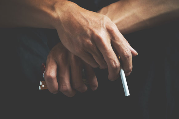 cigarette-addiction-tobacco-nicotine-smoke-unhealthy-danger-bad-narcotic-habit-white-filter-health-risk-cancer-illness-quit-stop-toxic-drug-lifestyle-concept-pack-hand
